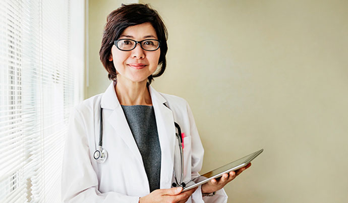 Doctor holding a tablet