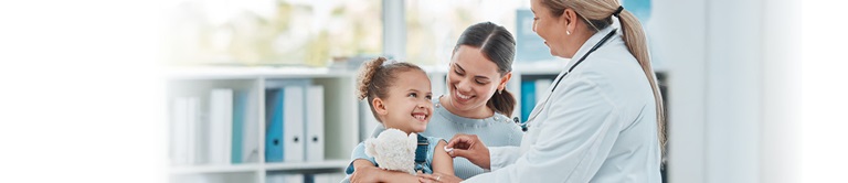 Nurse helping a child after an immunization.