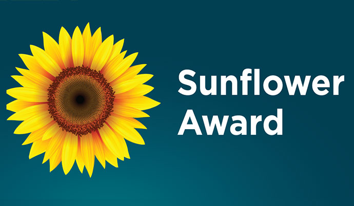 "Sunflower Award" text with a sunflower