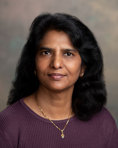 Vijaya Nirujogi, MD, FRCS