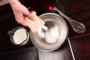 First, add pudding mix to bowl