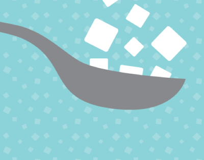 artificial sweeteners falling into spoon from someone with diabetes