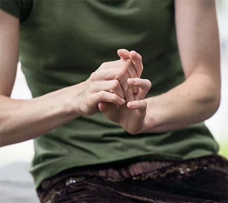 woman cracking her knuckles