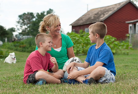 mom & sons on the family farm