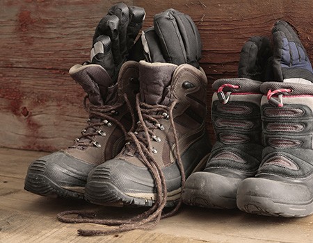2 pairs of winter boots with gloves inside