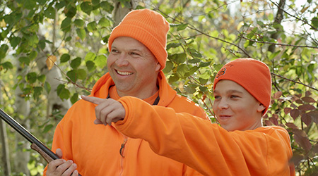 Father and son hunting together
