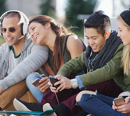 Four teenagers hanging out