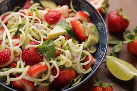 Zucchini, Strawberry, Avocado Salad made using a spiralizer to create zucchini noodles or zoodles