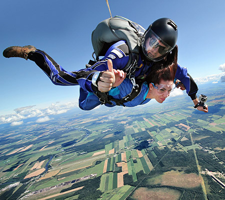 Man and woman skydiving