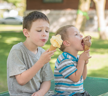 Two boys eating ice cream - Brain freeze