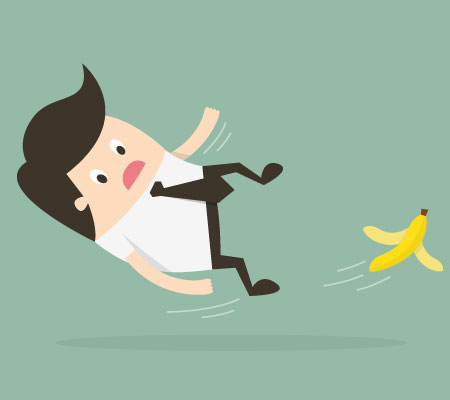 Graphic of businessman slipping on a banana and falling on his back