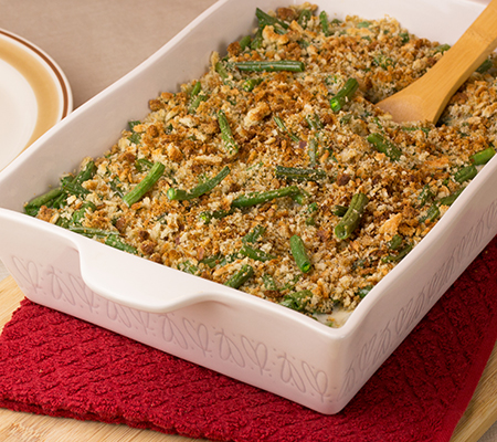 Healthy Green Bean Casserole in a white casserole dish - Thanksgiving casserole recipe