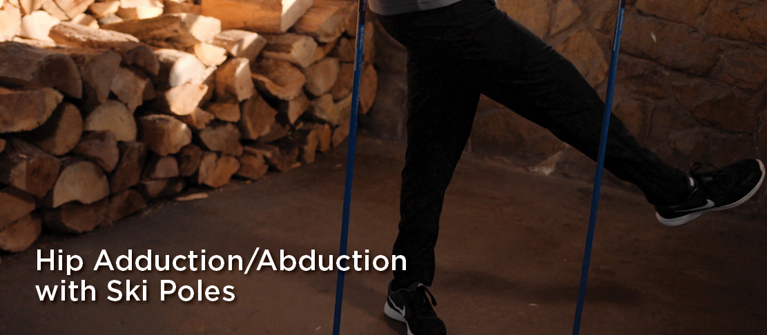 hip adduction abduction with ski poles warmup before skiing exercise