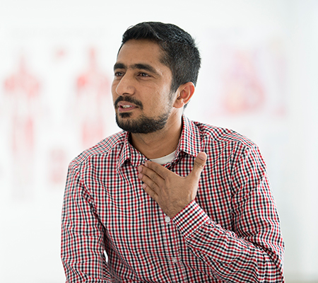 Man signaling a sore throat or lost voice - Laryngitis