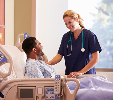 Patient and doctor in a hospital room - Heated chemotherapy, HIPEC procedure