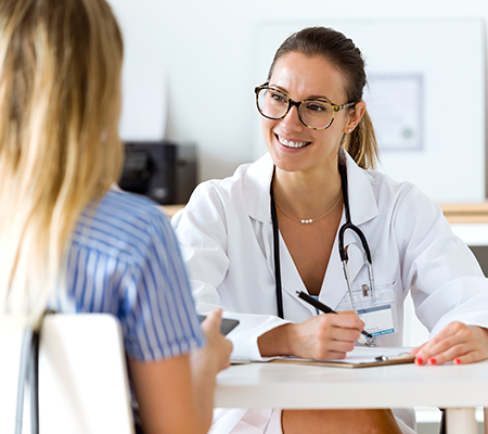 Female patient and doctor having a discussion - Painful sex