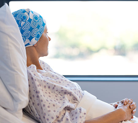 Cancer patient looking out the window - Removing tumors with surgery