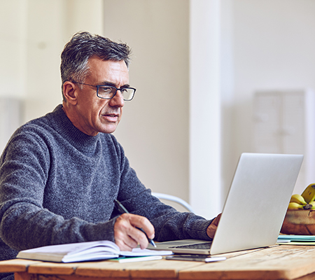 Man on laptop - Stem cell transplants