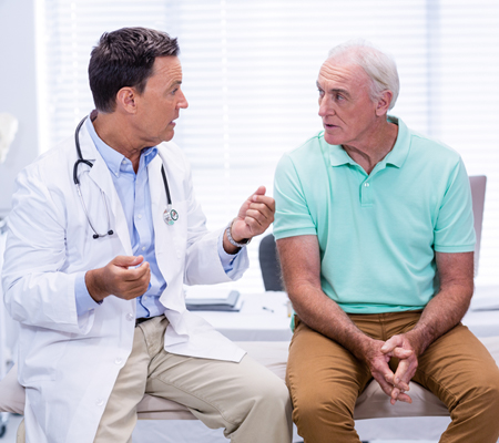 doctor explaining the SENTINEL Cerebral Protection System