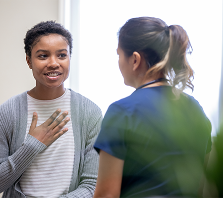 Image of patient talking to provider about health equity