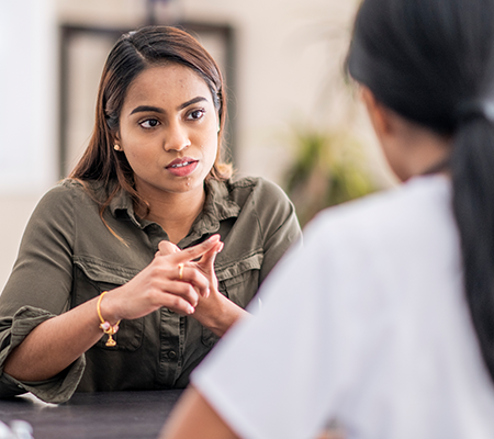 woman talking to a provider about mental health after sexual assault