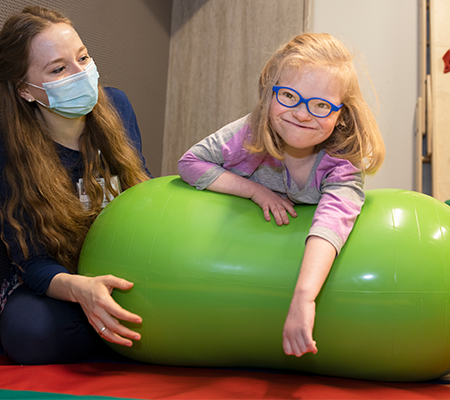 pediatric rehab with a child and physical therapist