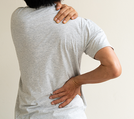 man holding his spine