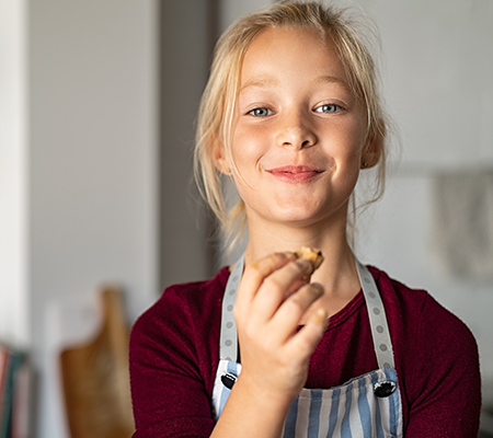 Young girl remembers to wash her hands and keep her hands off her face