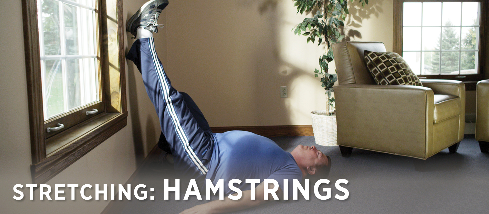demonstration of a hamstring stretch by man getting ready for hunting season